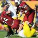 Michigan defensive end Craig Roh and linebacker Jake Ryan take down South Carolina quarterback Connor Shaw in the second half of the Outback Bowl at Raymond James Stadium in Tampa, Fla. on Tuesday, Jan. 1. Melanie Maxwell I AnnArbor.com
